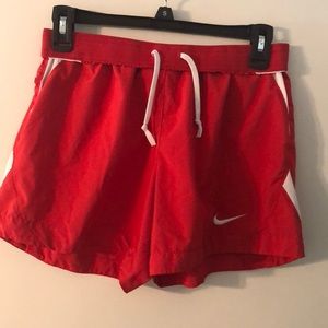 Red and white Nike shorts